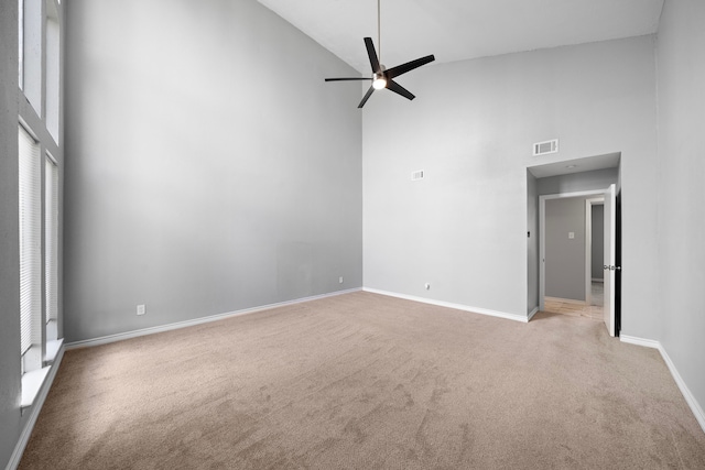 16111 Fan Tail Dr, Crosby, TX 77532 - empty room with high vaulted ceiling, light carpet, and a ceiling fan