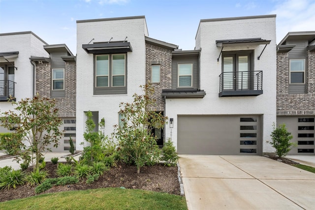 19911 Curved Steel Dr, Cypress, TX 77433 - view of front facade with brick siding, driveway, a garage, and a balcony