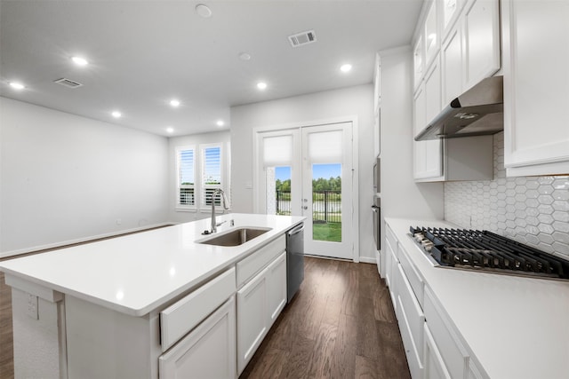 19911 Curved Steel Dr, Cypress, TX 77433 - kitchen with appliances with stainless steel finishes, extractor fan, dark wood finished floors, recessed lighting, and light countertops