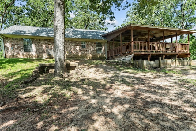 176 Bending Oak, Pollok, TX 75969 - back of house featuring ceiling fan and a shingled roof