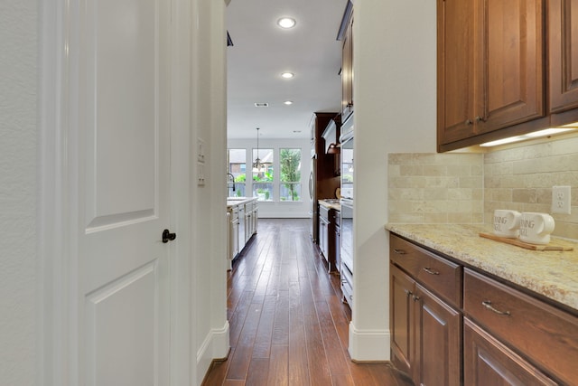 24918 Granite Bluff Ln, Katy, TX 77494 - corridor featuring dark wood-style floors and recessed lighting