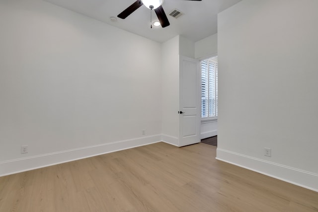 24918 Granite Bluff Ln, Katy, TX 77494 - spare room featuring a ceiling fan, light wood finished floors, and a smoke detector