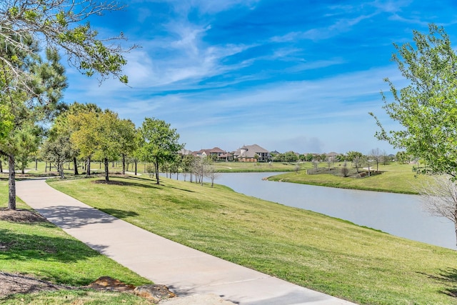24918 Granite Bluff Ln, Katy, TX 77494 - view of community featuring a water view and a lawn