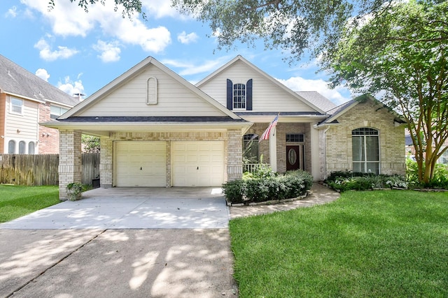 22602 Water Edge Ln, Katy, TX 77494 - view of front of home featuring brick siding, driveway, and a garage