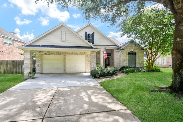 22602 Water Edge Ln, Katy, TX 77494 - traditional home featuring brick siding, driveway, and an attached garage