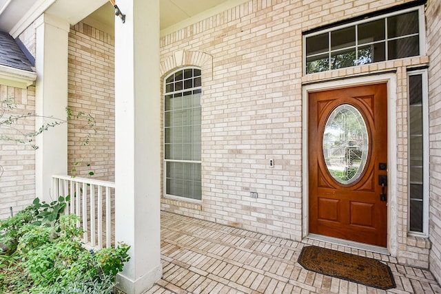 22602 Water Edge Ln, Katy, TX 77494 - entrance to property featuring covered porch and brick siding