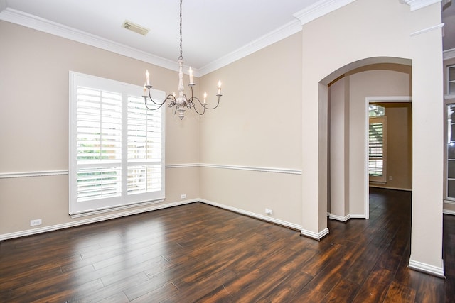 22602 Water Edge Ln, Katy, TX 77494 - spare room featuring a chandelier, arched walkways, wood finished floors, and ornamental molding