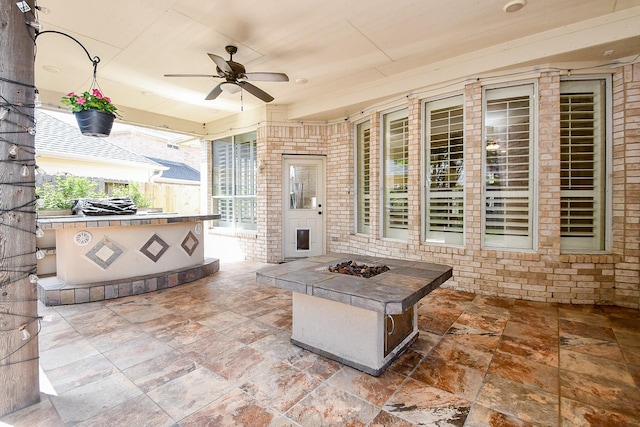22602 Water Edge Ln, Katy, TX 77494 - view of patio / terrace featuring an outdoor kitchen, ceiling fan, and a fire pit