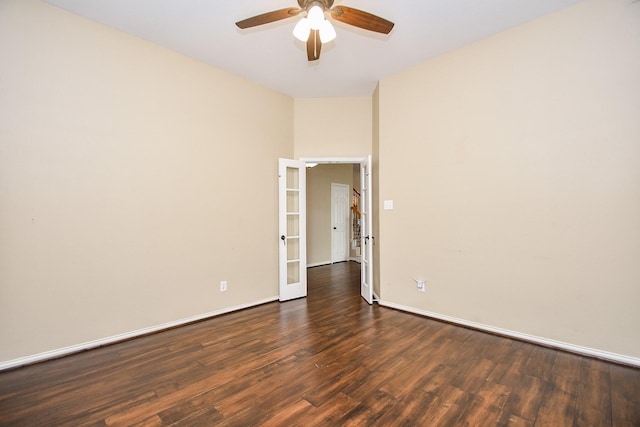 22602 Water Edge Ln, Katy, TX 77494 - empty room featuring french doors, dark wood-style flooring, and a ceiling fan