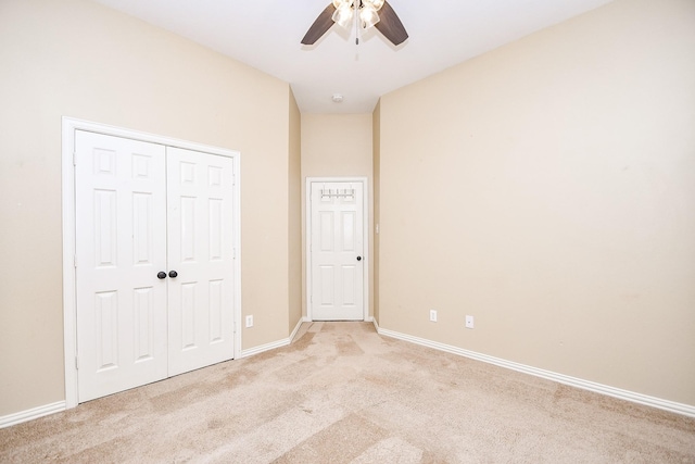 22602 Water Edge Ln, Katy, TX 77494 - unfurnished bedroom featuring light carpet, a closet, and a ceiling fan