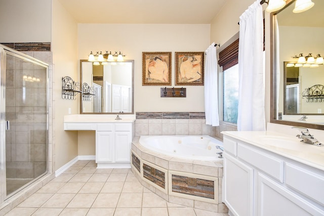 22602 Water Edge Ln, Katy, TX 77494 - bathroom featuring a shower stall, tile patterned flooring, a tub with jets, and two vanities