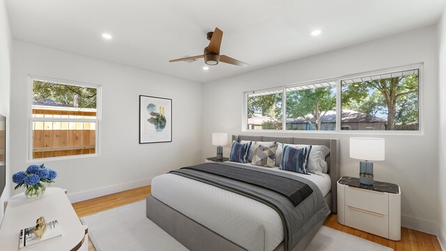 6414 Woodbrook Ln, Houston, TX 77008 - bedroom with wood finished floors, recessed lighting, and a ceiling fan
