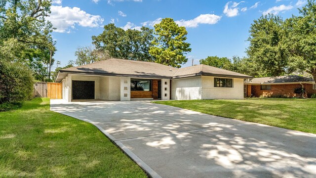 6414 Woodbrook Ln, Houston, TX 77008 - view of front of property with concrete driveway, brick siding, and a carport