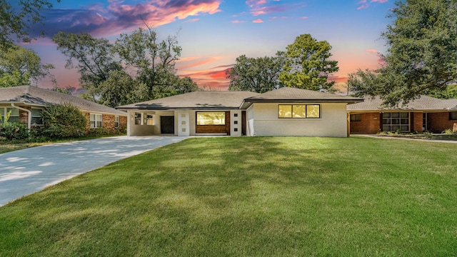 6414 Woodbrook Ln, Houston, TX 77008 - single story home featuring driveway, a front yard, an attached carport, and brick siding