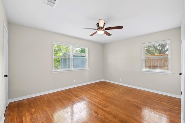 9614 Hammerly Blvd, Houston, TX 77080 - unfurnished room featuring wood-type flooring and a ceiling fan