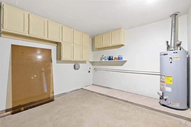 9614 Hammerly Blvd, Houston, TX 77080 - washroom with water heater and cabinet space