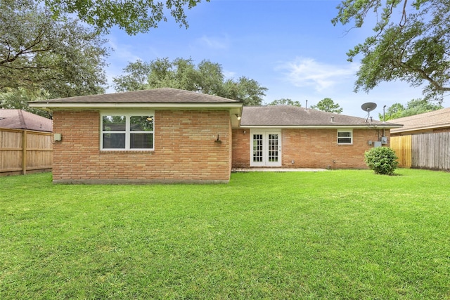 9614 Hammerly Blvd, Houston, TX 77080 - rear view of house with french doors and brick siding