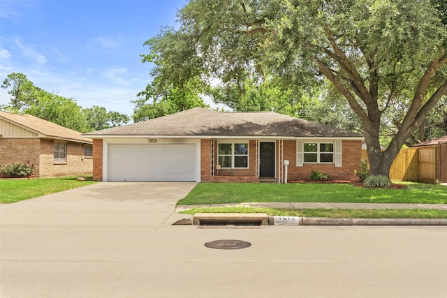 9614 Hammerly Blvd, Houston, TX 77080 - single story home featuring an attached garage, concrete driveway, brick siding, and roof with shingles