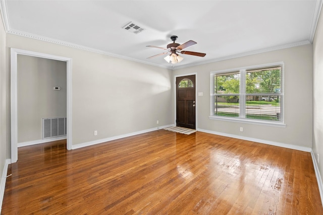 9614 Hammerly Blvd, Houston, TX 77080 - foyer featuring crown molding, wood-type flooring, and ceiling fan