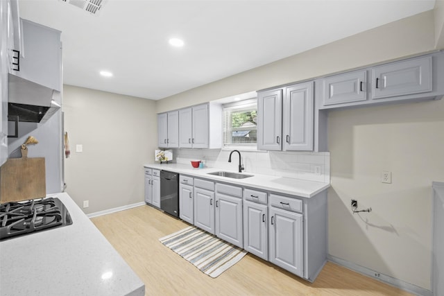 9614 Hammerly Blvd, Houston, TX 77080 - kitchen featuring dishwasher, gray cabinets, light wood-style floors, decorative backsplash, and recessed lighting