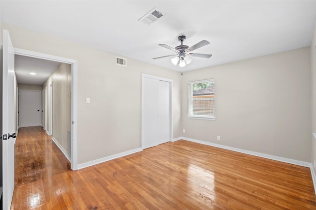 9614 Hammerly Blvd, Houston, TX 77080 - unfurnished bedroom featuring light wood finished floors, a closet, and ceiling fan
