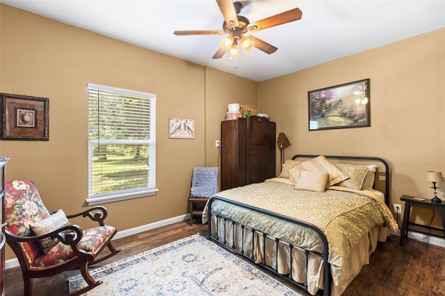 847 Cottletown Rd, Smithville, TX 78957 - bedroom featuring wood finished floors and ceiling fan