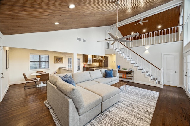 10707 Moonlight Dr, Houston, TX 77096 - living room with stairway, ceiling fan, high vaulted ceiling, wooden ceiling, and wood finished floors