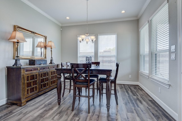 3207 Coach Horse Ln, Houston, TX 77080 - dining space featuring a chandelier, healthy amount of natural light, wood finished floors, ornamental molding, and recessed lighting