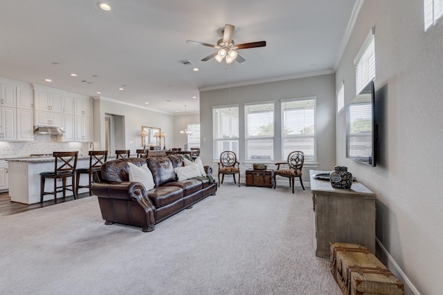 3207 Coach Horse Ln, Houston, TX 77080 - living room featuring a ceiling fan, recessed lighting, light colored carpet, and ornamental molding