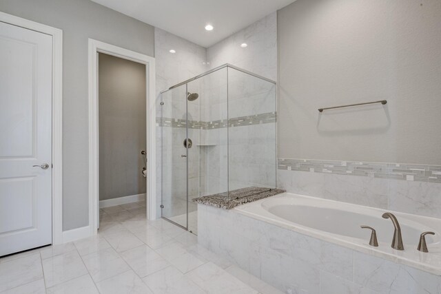 3207 Coach Horse Ln, Houston, TX 77080 - bathroom featuring a shower stall, a garden tub, marble finish floors, and recessed lighting