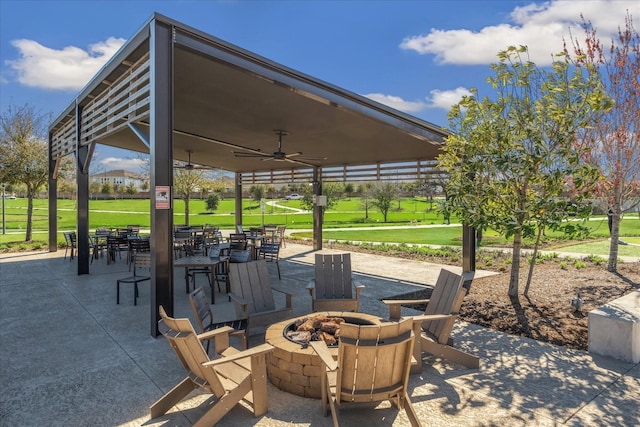 3207 Coach Horse Ln, Houston, TX 77080 - view of patio / terrace with an outdoor fire pit, ceiling fan, and outdoor dining space