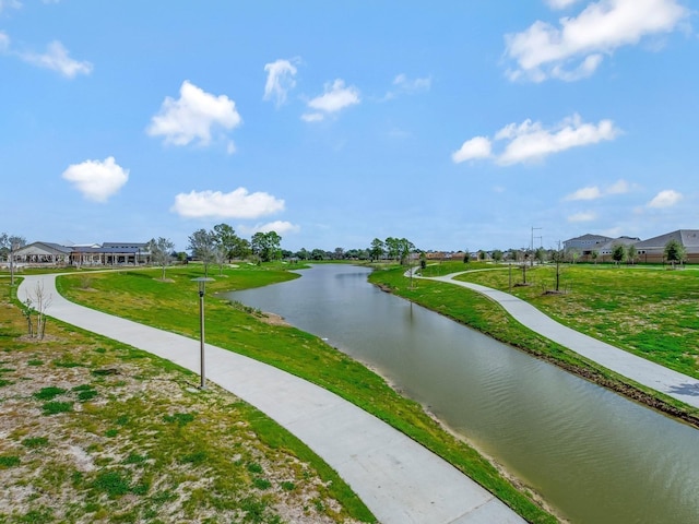 3207 Coach Horse Ln, Houston, TX 77080 - view of property's community with a water view and a lawn