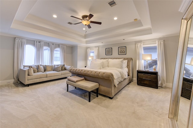 5531 Pine St Unit H, Houston, TX 77081 - bedroom featuring a raised ceiling, light colored carpet, ornamental molding, recessed lighting, and a ceiling fan