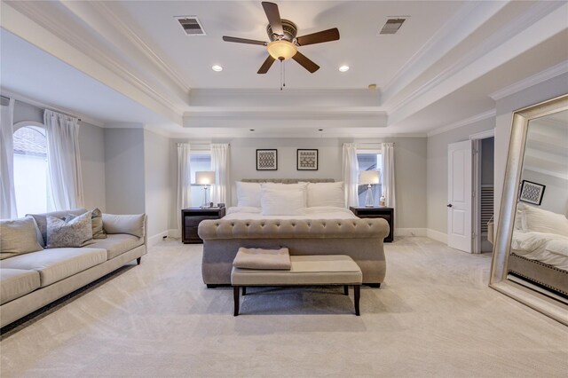 5531 Pine St Unit H, Houston, TX 77081 - bedroom with a tray ceiling, light carpet, crown molding, and ceiling fan