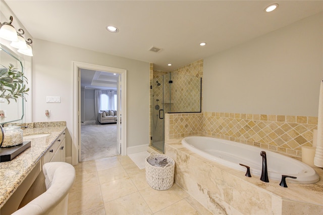 5531 Pine St Unit H, Houston, TX 77081 - full bath featuring a stall shower, a garden tub, vanity, recessed lighting, and tile patterned floors
