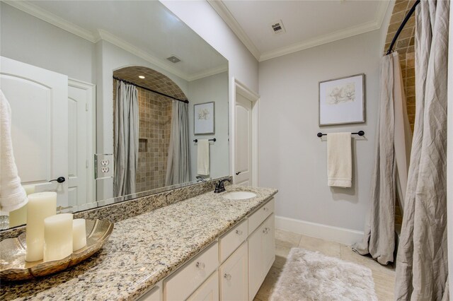 5531 Pine St Unit H, Houston, TX 77081 - bathroom with vanity, crown molding, curtained shower, and tile patterned flooring