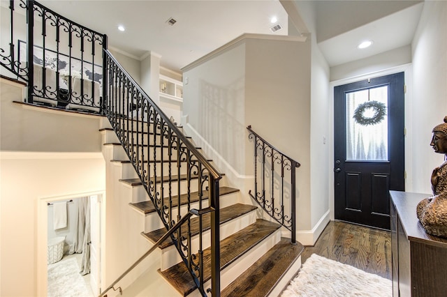 5531 Pine St Unit H, Houston, TX 77081 - entrance foyer featuring stairway, wood finished floors, ornamental molding, and recessed lighting
