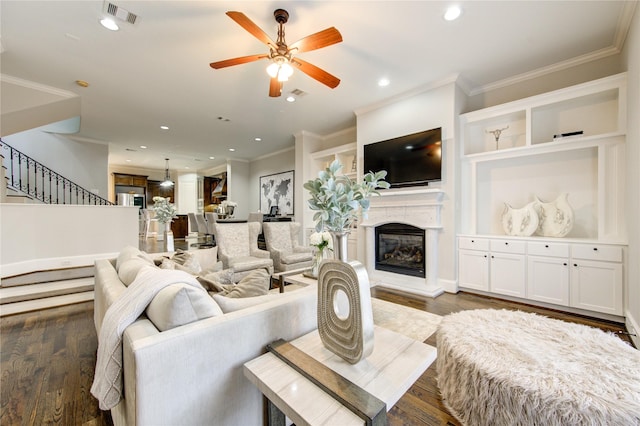 5531 Pine St Unit H, Houston, TX 77081 - living area featuring recessed lighting, stairway, wood finished floors, ceiling fan, and ornamental molding
