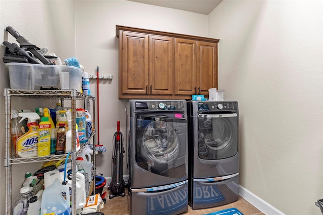 2928 San Milan Pass, Round Rock, TX 78665 - laundry area featuring cabinet space, washer and clothes dryer, and tile patterned flooring