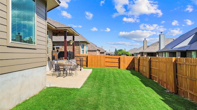 2928 San Milan Pass, Round Rock, TX 78665 - fenced backyard with a ceiling fan, a patio, and a residential view