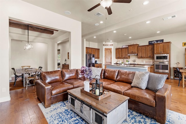 2928 San Milan Pass, Round Rock, TX 78665 - living area featuring ceiling fan, light wood-type flooring, and recessed lighting