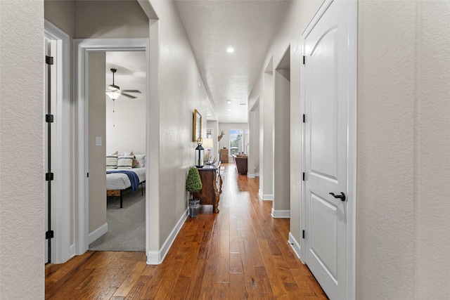 2928 San Milan Pass, Round Rock, TX 78665 - hallway featuring wood-type flooring and recessed lighting
