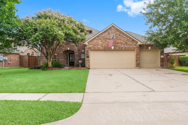 31820 Forest Oak Ln, Conroe, TX 77385 - traditional-style home featuring roof with shingles, an attached garage, driveway, and brick siding