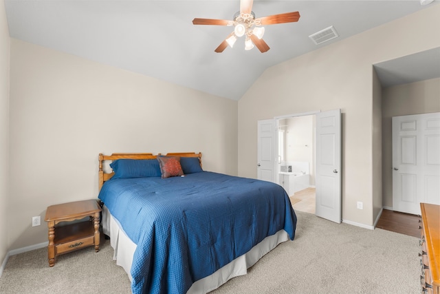 31820 Forest Oak Ln, Conroe, TX 77385 - bedroom with carpet flooring, lofted ceiling, ensuite bathroom, and ceiling fan