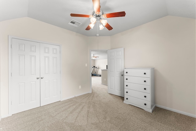 31820 Forest Oak Ln, Conroe, TX 77385 - unfurnished bedroom with lofted ceiling, carpet floors, a closet, and ceiling fan
