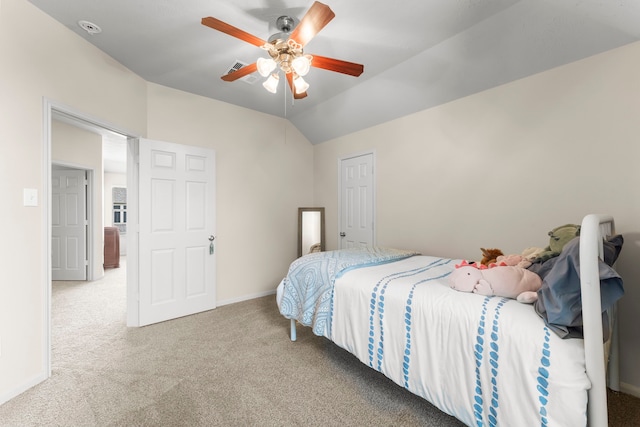 31820 Forest Oak Ln, Conroe, TX 77385 - bedroom with carpet floors, vaulted ceiling, and a ceiling fan