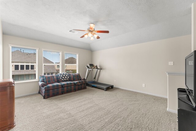 31820 Forest Oak Ln, Conroe, TX 77385 - living area with ceiling fan, a textured ceiling, and carpet floors