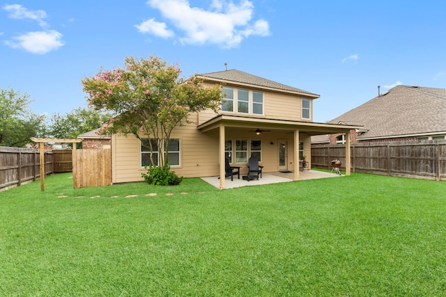 31820 Forest Oak Ln, Conroe, TX 77385 - back of property featuring a fenced backyard, ceiling fan, and a patio