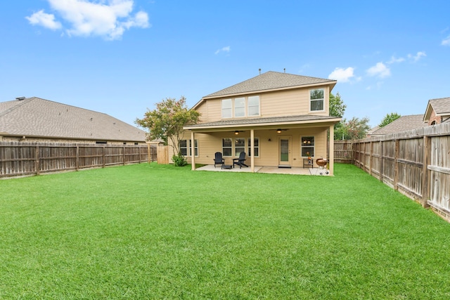 31820 Forest Oak Ln, Conroe, TX 77385 - rear view of house featuring ceiling fan, a fenced backyard, and a patio area