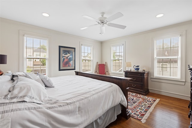 1311 Peden St, Houston, TX 77006 - bedroom featuring ornamental molding, wood finished floors, recessed lighting, and ceiling fan